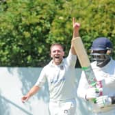 Gone: Carlton bowler Jonathan Rudge, who took six wickets, has Ossett's Sajith Wamakulasuriya caught by wicketkeeper Thomas Taylor for 0 in the Bradford League. Pictures: Steve Riding