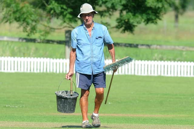 Hot work: 
Former Yorkshire groundsman Keith Boyce still looking after the pitch at The Richmond Oval home of New Rover.