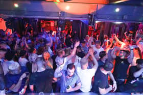 People dancing in Bar Fibre in Leeds, after the final legal coronavirus restrictions were lifted in England at midnight. Picture date: Monday July 19, 2021. PA Photo. See PA story HEALTH Coronavirus. Photo credit should read: Ioannis Alexopoulos/PA Wire