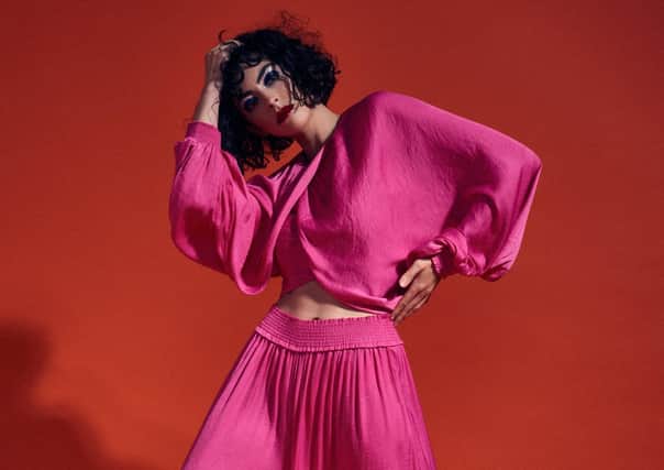 Hot pink balloon sleeve top, £29.99; palazzo trousers, £29.99, Zara.