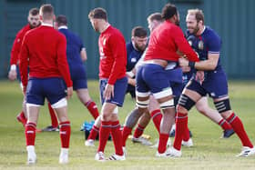 Push and Shove: Courtney Lawes and Alun Wyn Joes, right, get to grips with each other during training yesterday. Picture: Steve Haag/PA Wire: