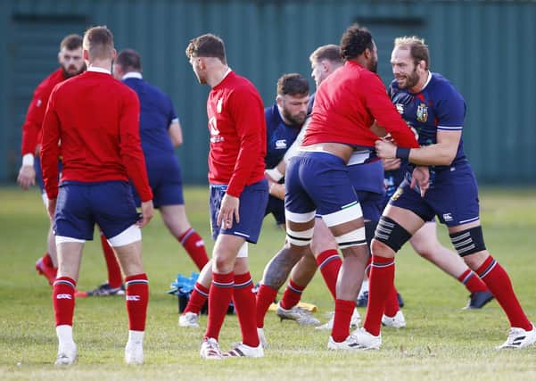 Push and Shove: Courtney Lawes and Alun Wyn Joes, right, get to grips with each other during training yesterday. Picture: Steve Haag/PA Wire: