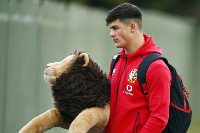 Mascot: Louis Rees-Zammit of the British & Irish Lions carries the tour mascot during the training session at the Hermanus High School, South Africa. Picture: Steve Haag/PA Wire.