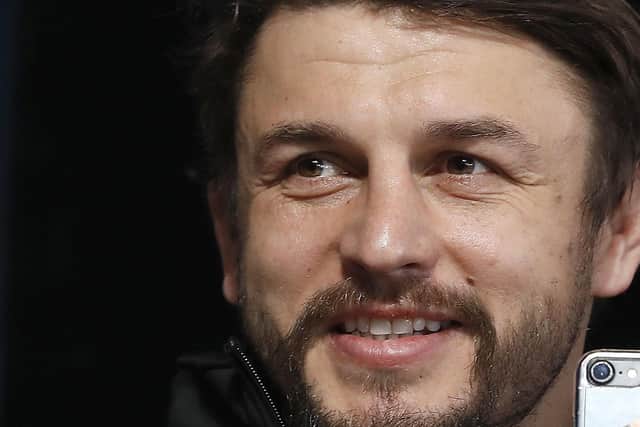 Former St Helens club-mate and current TV pundit Jon Wilkin has been instrumental in helping Hull FC's Adam Swift improve his form. Picture: Martin Rickett/PA Wire.
