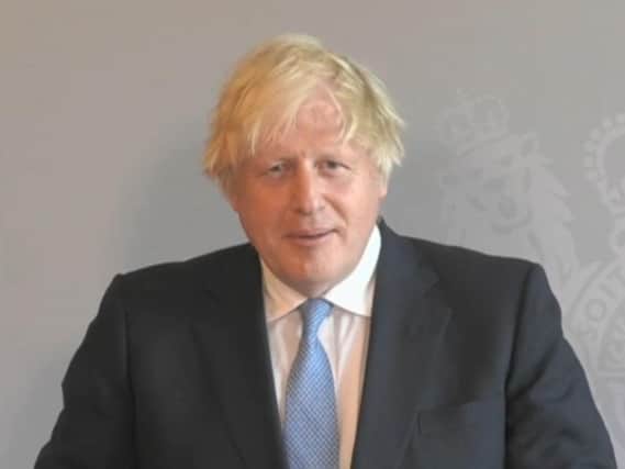Prime Minister Boris Johnson speaks via videolink during Prime Minister's Questions today (July 21)
