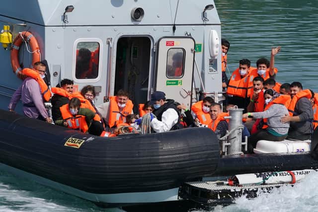 A group of people thought to be migrants are brought in to Dover, Kent, onboard a border force boat following a small boat incident in the Channel.