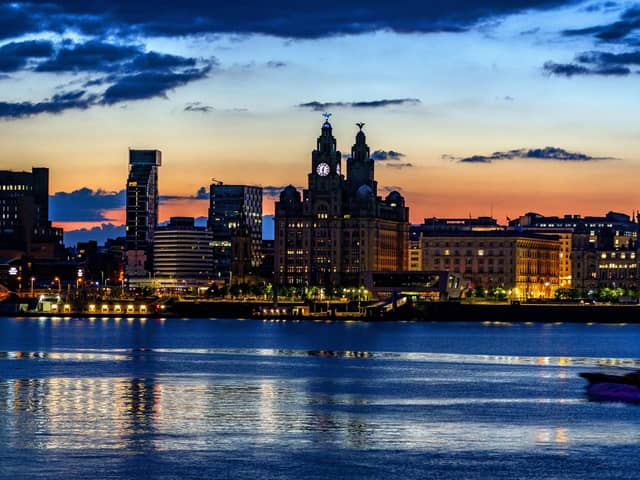 File photo dated 5/6/2021 of the view across the River Mersey just before the sun rises behind the Liverpool waterfront. The city has been deleted from the World Heritage List after a United Nations committee found developments including the new Everton FC stadium threatened the value of the city's waterfront.