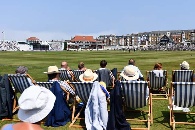 SEASIDE RETURN: Spectators enjoy Yorkshire's opening Royal London Cup match againt Surrey at North Marine Road. Picture: Will Palmer/SWpix.com.
