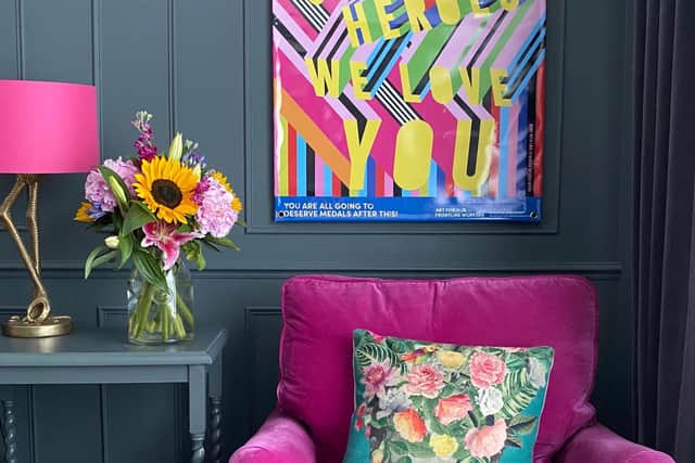 Pops of colour on one wall of the sitting room