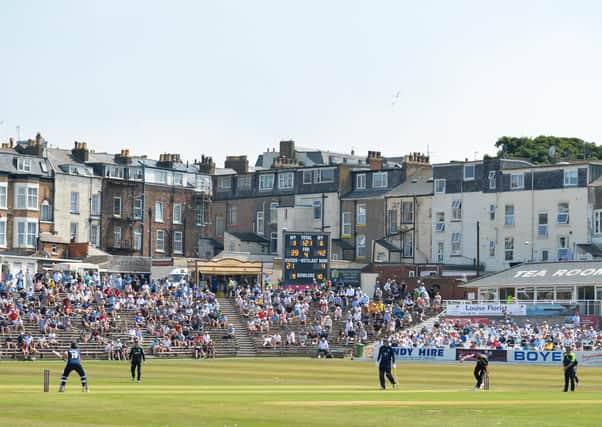 Picture postcard: Yorkshire and Surrey in action during their Royal London Cup tie at Scarborough yesterday, which the visitors won by five wickets. Picture: Will Palmer/SWpix.com