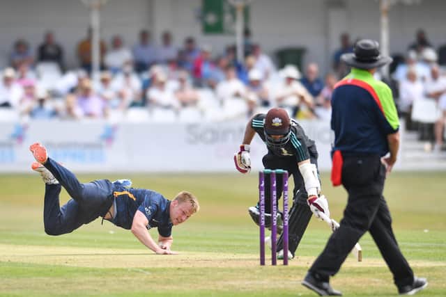 Close call: Yorkshire's Matthew Waite dives for the ball during the defeat by Surrey. Picture: Will Palmer/SWpix.com
