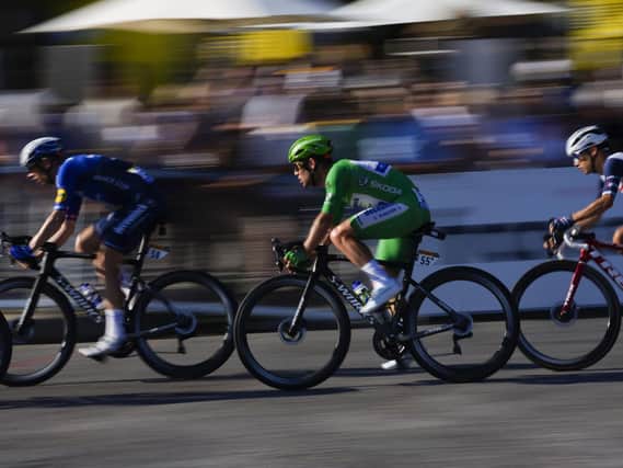 Britain's Mark Cavendish, wearing the best sprinter's green jersey. (AP Photo/Daniel Cole).