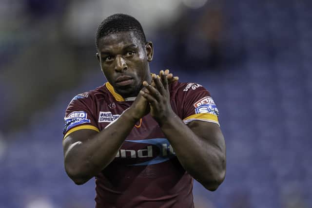 Applause: Huddersfield's Jermaine McGillvary thanks the fans for their support after his side defeat Hull FC.