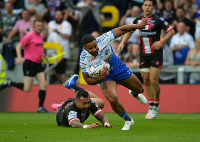 TOP PERFORMER: Leeds Rhinos Kruise Leeming on his way to scoring the second try against Salford Red Devils, his first of two.  Picture: Jonathan Gawthorpe