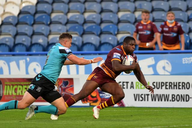 SHOCK DEFEAT: Huddersfield Giants' Jermaine McGillvary scores his hat-trick try. Picture : Jonathan Gawthorpe