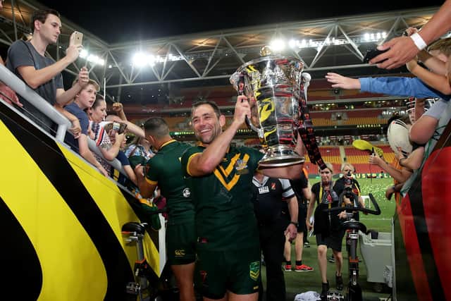 Australia's Cameron Smith of the Kangaroos holds aloft the Rugby League World Cup Trophy after winning the 2017 Rugby League World Cup Final against England at Brisbane's Suncorp Stadium,  Brisbane in December 2017. Picture: Matt King/Getty Images