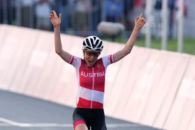 Austria's Anna Kiesenhofer celebrates winning the Women's Road Race at the Fuji International Speedway. Picture: Martin Rickett/PA