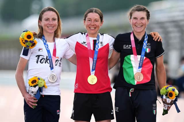Medalists Austria's Anna Kiesenhofer (gold), Netherland's Annemiek van Vleuten (silver) and Italy's Elisa Longo Borghini (bronze) during the medal ceremony after the Women's Road Race. Picture: Martin Rickett/PA