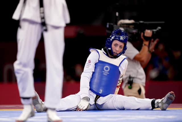 Great Britain's Jade Jones contemplates defeat in her -57KG Round of 16 match against Refugee Olympic Team's Kimia Alizadeh Zonoozi. Picture: Mike Egerton/PA