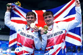 Stars: Great Britain's Tom Daley, left, and Matty Lee celebrate winning gold.