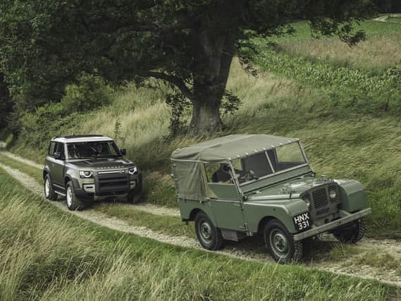 A new generation Land Rover Defender with an original Series I model