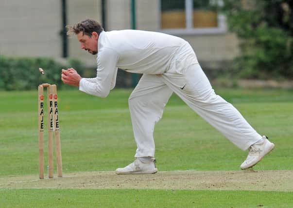 Bradford League: 
Jack Hughes of Townville whips off a bail to run out Shahban Raheem of Hanging Heaton for one run. Hughes took two wickets and scored 95 in the win. Picture: Steve Riding