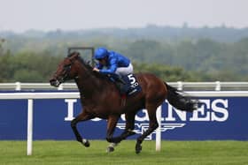 Adayar ridden by jockey William Buick on their way to winning the King George VI And Queen Elizabeth Qipco Stakes.