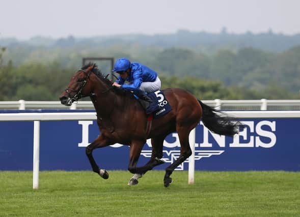 Adayar ridden by jockey William Buick on their way to winning the King George VI And Queen Elizabeth Qipco Stakes.
