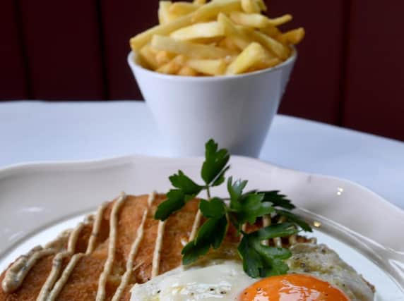 Chicken schnitzel with truffle mayo and fried egg. (Simon Hulme).