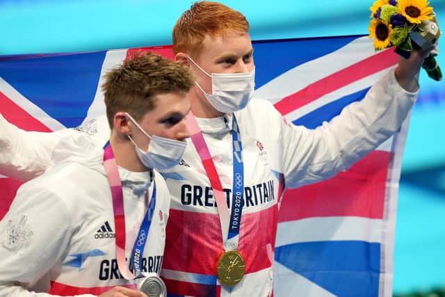 Dynamic duo: Great Britain's Tom Dean, right, with his gold alongside silver medallist Duncan Scott.