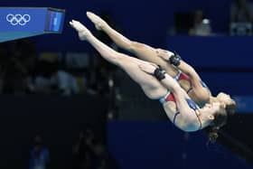 In unison: Eden Cheng and Lois Toulson of Britain compete during the women's synchronized 10m platform diving final.
