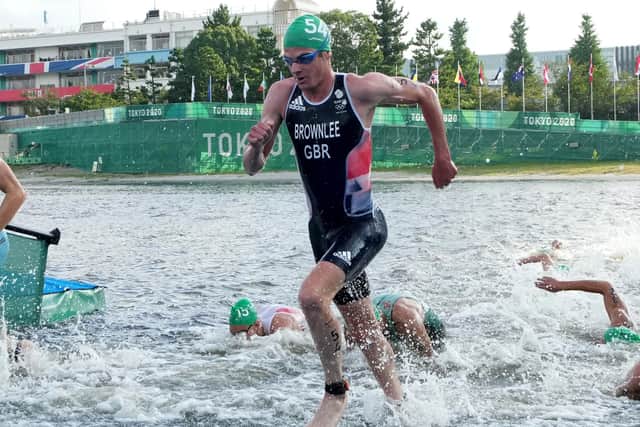 NOT THIS TIME: Jonathan Brownlee exits the water during the men's Triathlon at the Odaiba Marine Park. Picture: Martin Rickett/PA