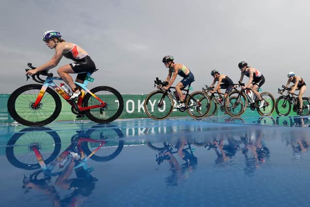 TORRENTIAL: The competitors in the women's triathlon had to endure difficult conditions on day four of the Tokyo Olympics. Pictures: Getty Images.