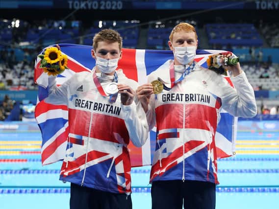 GOLD AND SILVER: Duncan Scott and Tom Dean with their medals from Tokyo. Picture: Getty Images.