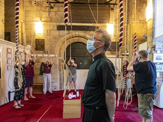 The Very Revd John Dobson, Dean of Ripon, listens to bellringers back together in the bell tower for the first time since the pandemic struck Picture: Tony Johnson