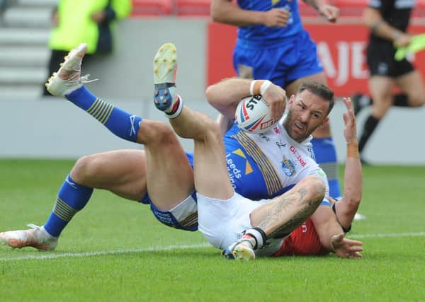 Luke Gale scoring a try against Salford has lost the captaincy of Leeds Rhinos (Picture: Steve Riding)