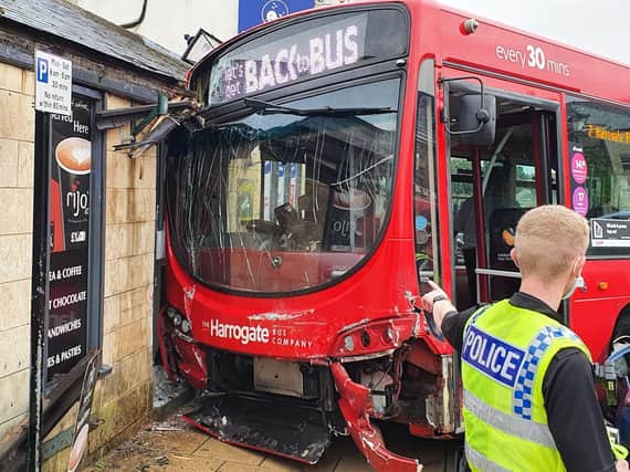 A bus has hit the shop front of Youngs of Wetherby with fire crews currently at the scene assessing the damage. Photo credit: Submitted photo