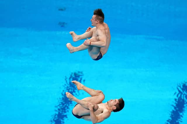 TOUGH DAY: Daniel Goodfellow and Jack Laugher seem out of synch during the Men's Synchronised 3m Springboard Final at the Tokyo Aquatics Centre where they finished seventh. Picture: Mike Egerton/PA