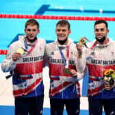 Great Britain's Duncan Scott, Tom Dean, Matthew Richards and James Guy celebrate gold in the Men's 4x200 freestyle relay at Tokyo Aquatics Centre on the fifth day of the Tokyo 2020 Olympic Games in Japan.