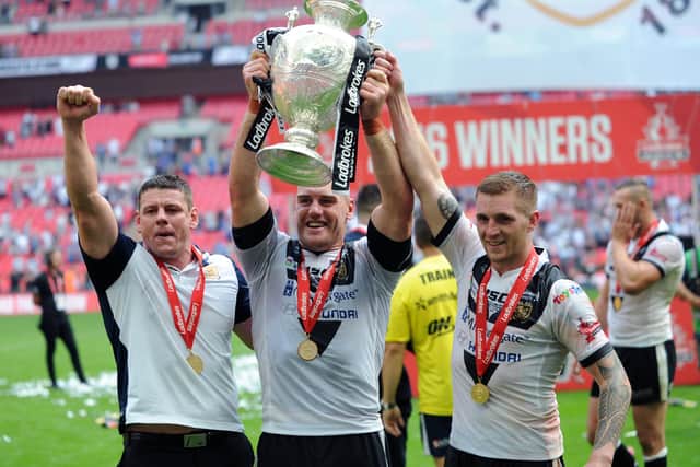MAGIC MOMENT: Marc Sneyd, right, celebrates winning the Challenge Cup at Wembley with Hull FC with coach Lee Radford, left and captain Gareth Ellis, defeating Warrington Wolves in 2016. Picture: Jonathan Gawthorpe