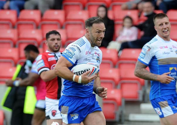 VITAL ROLE: 
Luke Gale scores a try for Leeds Rhinos against Salford Red Devils in Picture: Steve Riding.