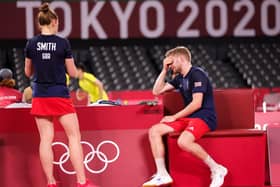 DISAPPOINTED: Huddersfield's Marcus Ellis, right, looks dejected after he and Lauren Smith lose against Hong Kong's Tang Chun Man and Tse Ying Suet during a Mixed Doubles Quarter-final match at Musashino Forest Sport Plaza. Picture: Lintao Zhang/Getty Images