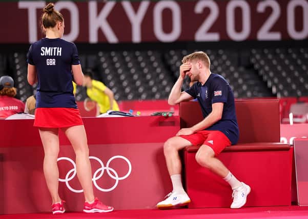 DISAPPOINTED: Huddersfield's Marcus Ellis, right, looks dejected after he and Lauren Smith lose against Hong Kong's Tang Chun Man and Tse Ying Suet during a Mixed Doubles Quarter-final match at Musashino Forest Sport Plaza. Picture: Lintao Zhang/Getty Images