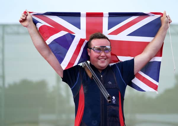 Great Britain: Matthew Coward-Holley celebrates after winning his medal.
