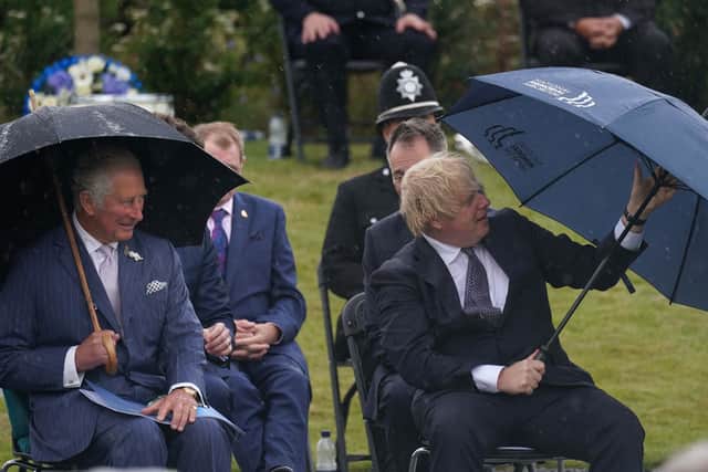 The Prince of Wales (left) and Prime Minister Boris Johnson at the unveiling of the UK Police Memorial at the National Memorial Arboretum.