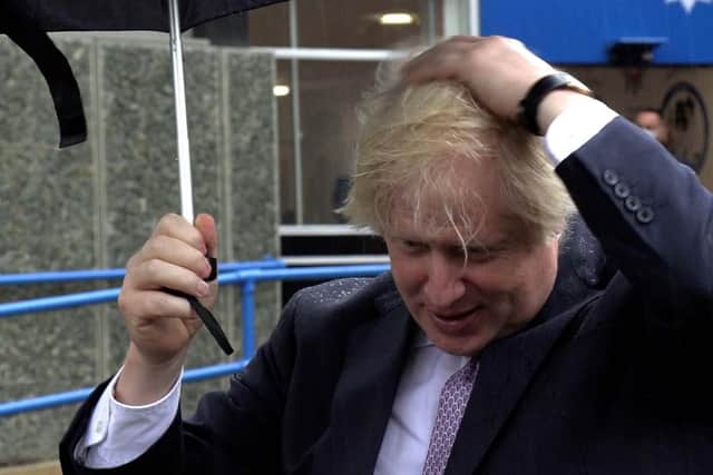 Grab from PA video of Prime Minister Boris Johnson speaking to the media during a visit to Surrey Police headquarters in Guildford, Surrey, to coincide with the publication of the government's Beating Crime Plan.