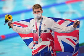 Silver star: Duncan Scott on the podium for the men's 200m individual medley.
