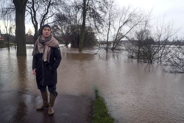 Environment Minister Rebecca Pow witnessing flooding in Worcestershire.
