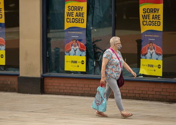 How can the tide of shop closures be addressed?
