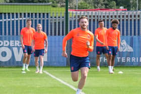 up and running: Ollie Turton being put through his paces during pre-season training. Picture: Courtesy Huddersfield Town